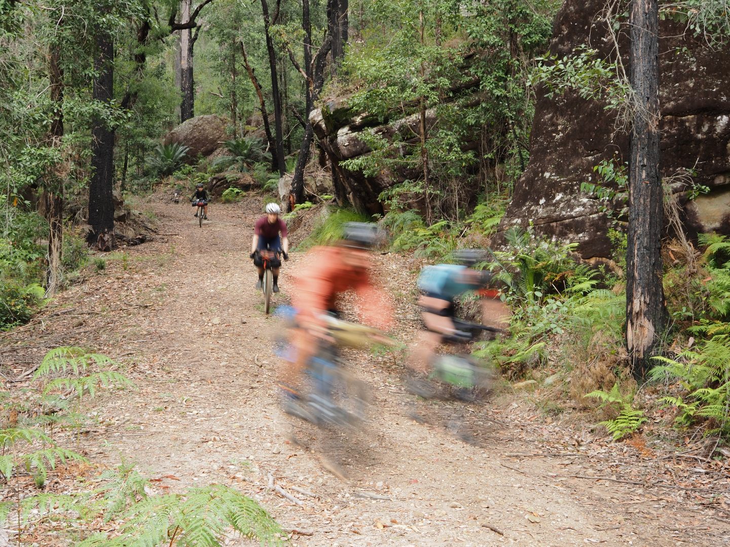 Riders descending down the pass
