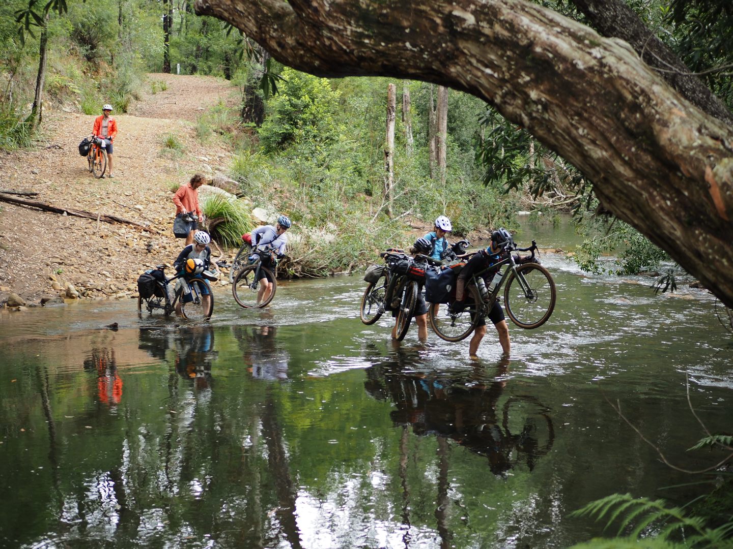 Riders crossing the river