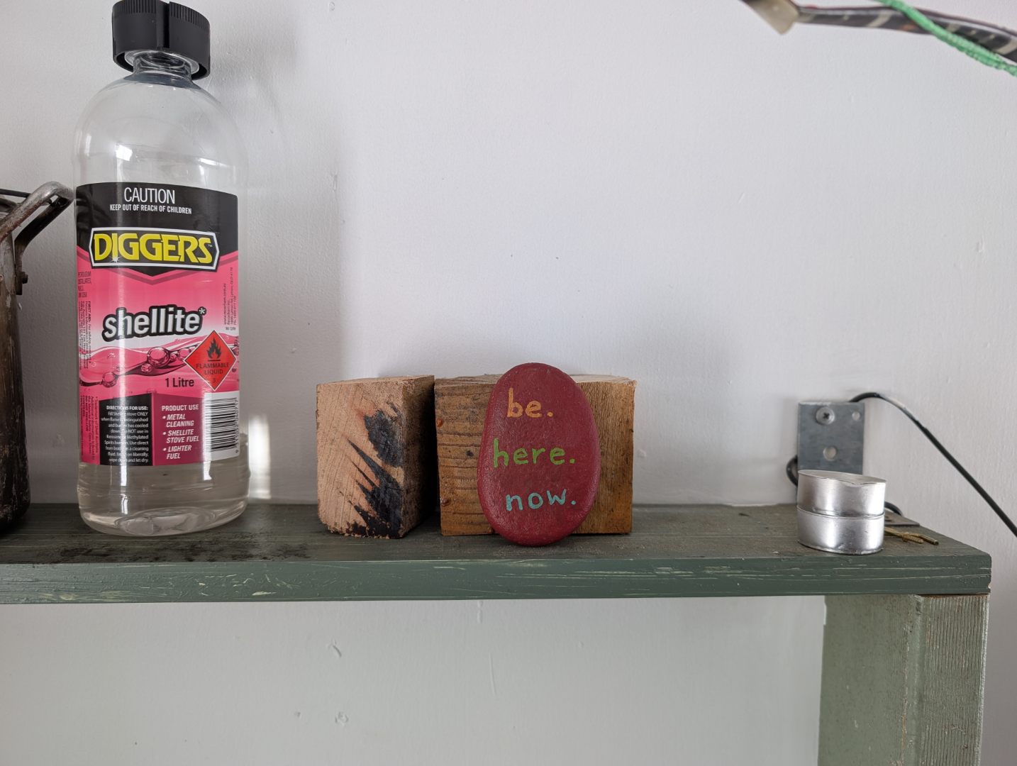 Stone that says Be. Here. Now.